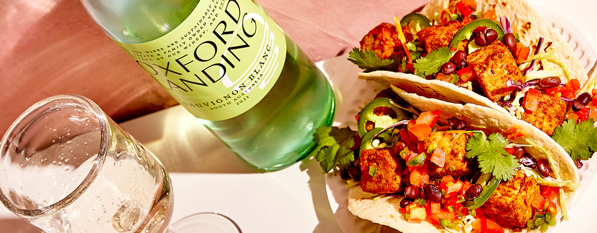 These bright and colourful Tacos, filled with all the usuals - lettuce, jalapenos, tomato, corn, black beans and chipotle sauce, are the perfect summerparty food and a great reason to enjoy a wine with friends - in this case,a refreshing Oxford Landing Sauvignon Blanc. Although… who needs a reason!